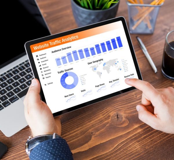 Man,Viewing,Website,Traffic,Analytics,Data,On,Tablet,Computer